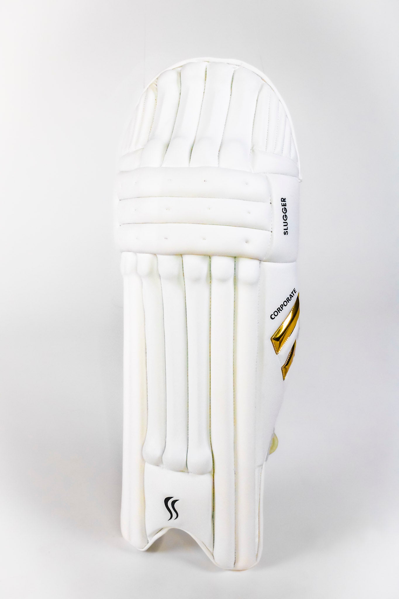 A close-up of one slugger white batting pad, highlighting its fabric and elegant design , set against a plain backdrop.